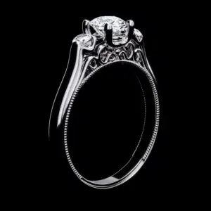 3D jewelry rendering of a white metal ring with intricate detailing on a black background, highlighting luxury design.