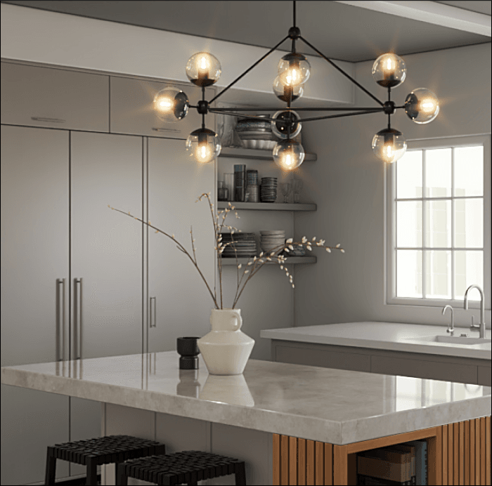 a luxury kitchen island with pendant lighting and marble countertop