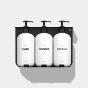 Photorealistic 3D rendering of black triple bottle holder mounted on white bathroom wall holding shampoo, conditioner and body wash bottles