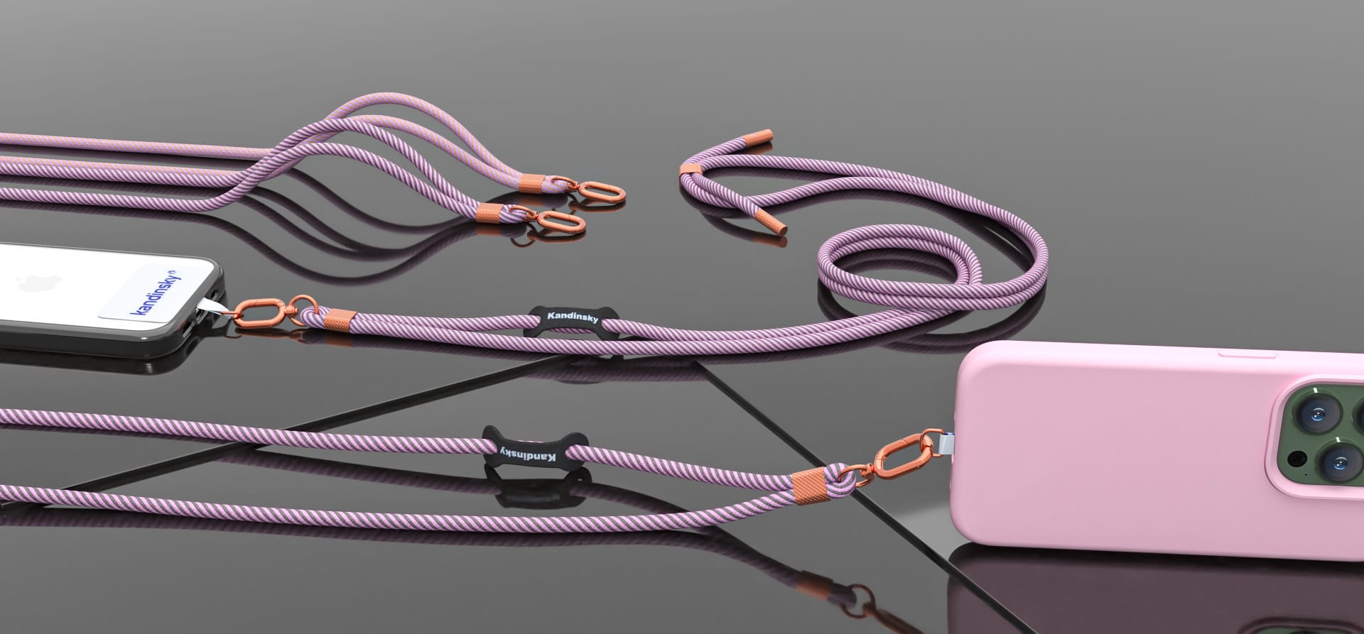 3D rendering of Kandinsky smartphone lanyard with pink and purple braided cord and rose gold clips, showcasing stylish phone accessories on a reflective black surface.