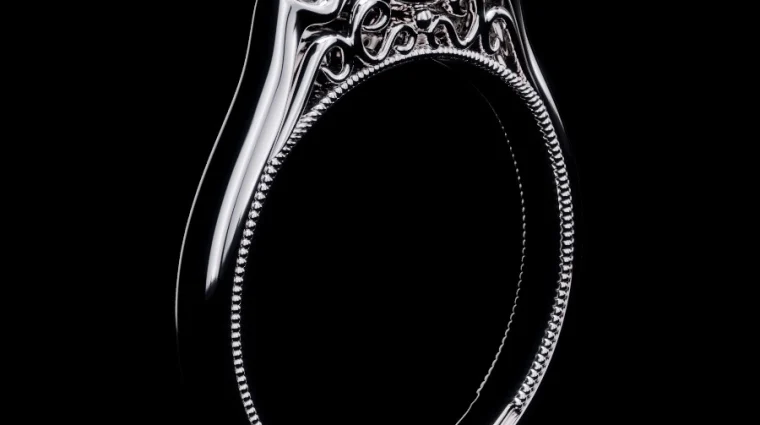 3D jewelry rendering of a white metal ring with intricate detailing on a black background, highlighting luxury design.